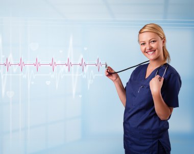 Güzel doktor kırmızı nabız ve kalp atışlarını dinliyor.
