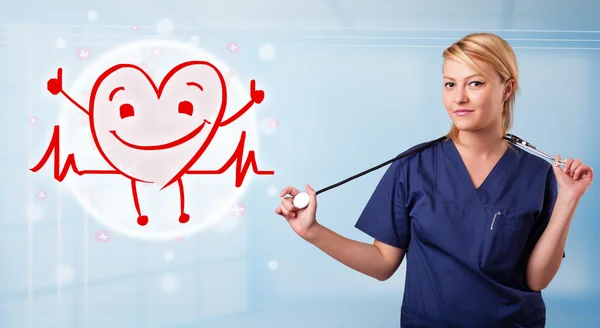 Attractive doctor with happy red smiling heart — Stock Photo, Image