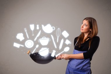 Mutfak aksesuar ikonlarıyla genç bir kadın.