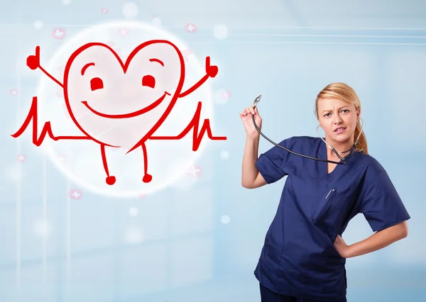 Attractive doctor with happy red smiling heart — Stock Photo, Image