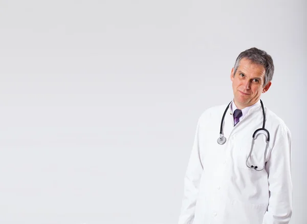 Doctor listening to empty copy space with stethoscope — Stock Photo, Image