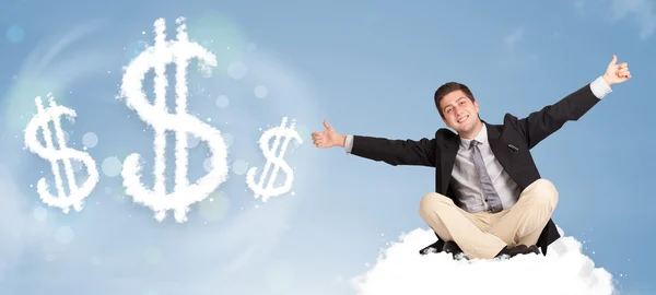 Attraktiver Mann sitzt auf Wolke neben Wolke Dollarzeichen — Stockfoto