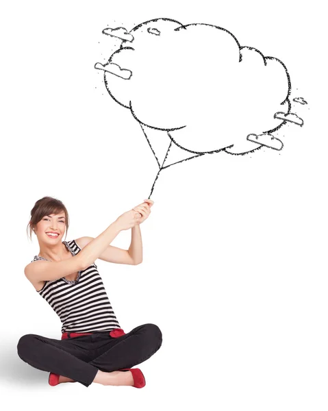 Young lady holding cloud balloon drawing — Stock Photo, Image