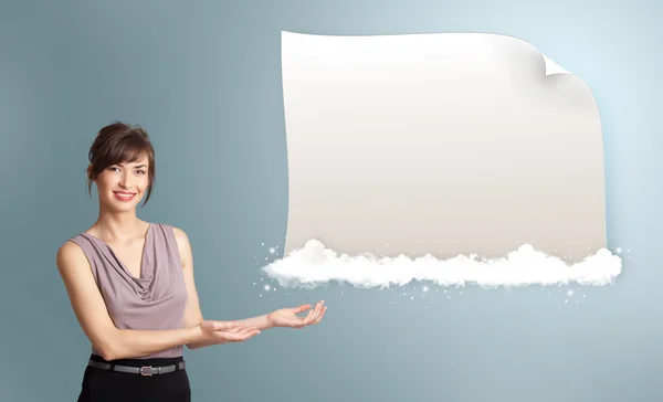 Pretty woman presenting modern copy space on clouds — Stock Photo, Image