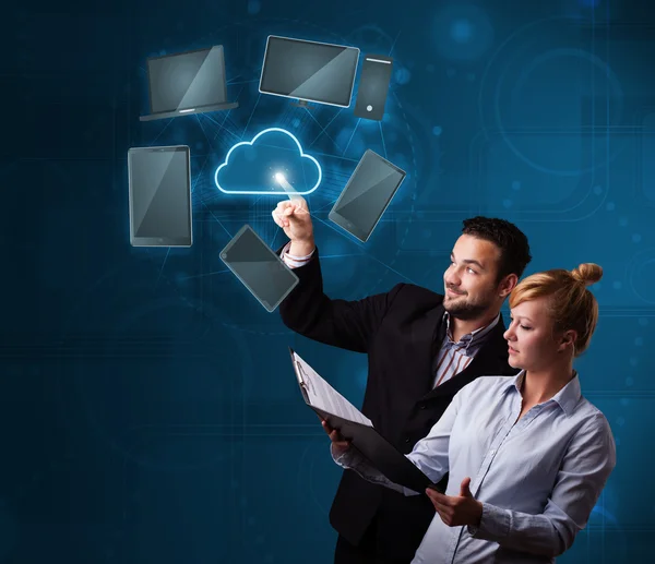Happy couple touching cloud service — Stock Photo, Image