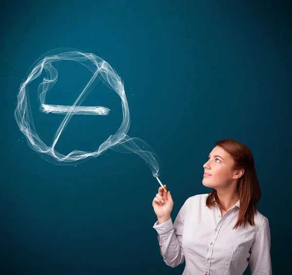 Young lady smoking unhealthy cigarette with no smoking sign — Stock Photo, Image