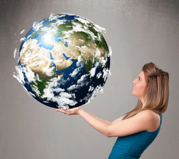 Pretty girl holding 3d planet earth — Stock Photo, Image