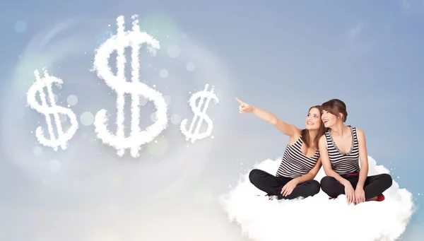 Young women sitting on cloud next to cloud dollar signs — Stock Photo, Image
