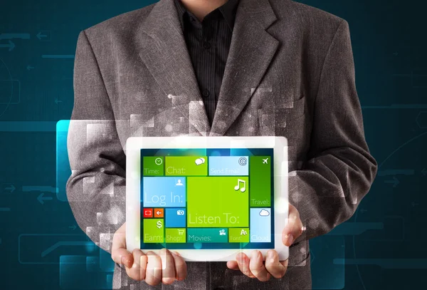 Businessman holding a tablet with modern software operational sy — Stock Photo, Image