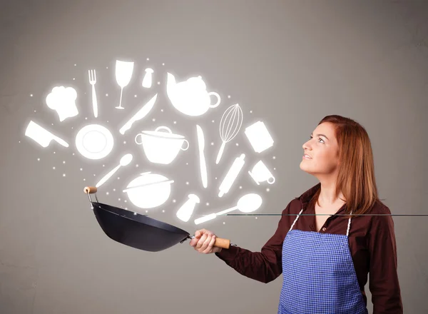 Mujer joven con iconos accesorios de cocina — Foto de Stock