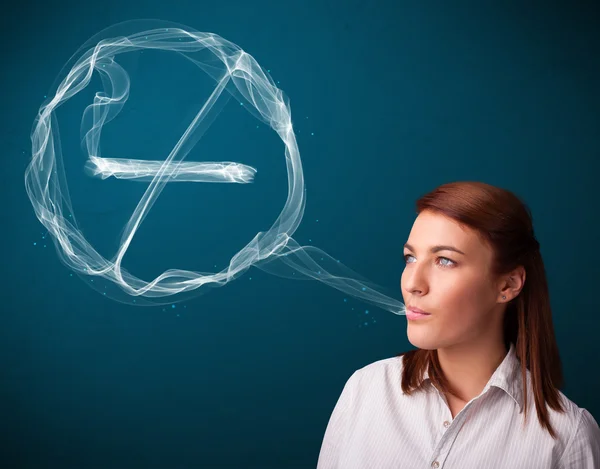 Young lady smoking unhealthy cigarette with no smoking sign — Stock Photo, Image