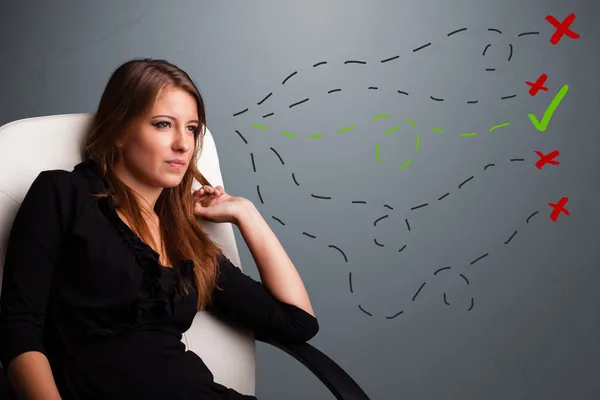 Young woman choosing between right and wrong signs — Stock Photo, Image
