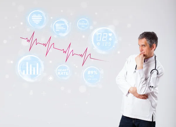 Doctor examinating modern heartbeat graphics — Stock Photo, Image