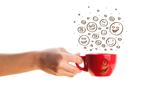Café-taza con la mano marrón dibujado caras sonrientes felices — Foto de Stock