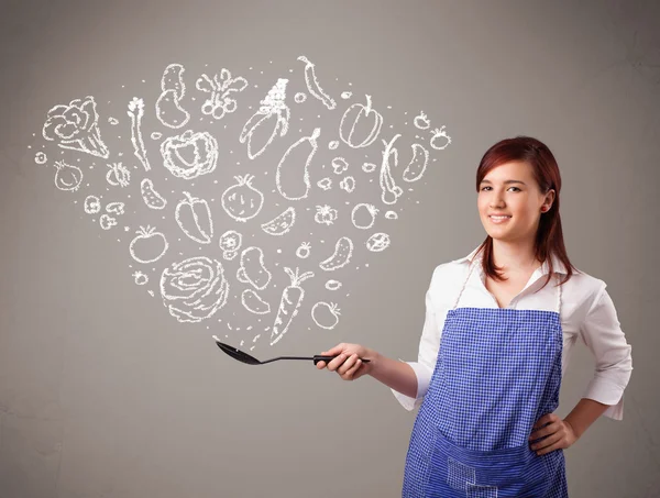 Vrouw koken groenten — Stockfoto