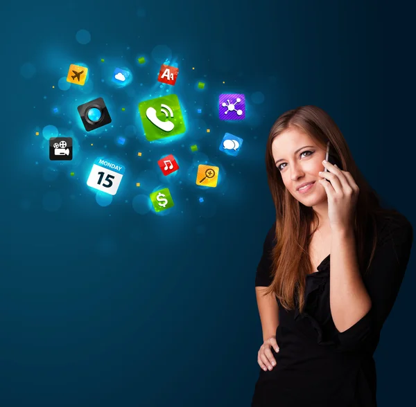 Young woman calling by phone with various icons — Stock Photo, Image