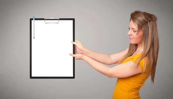 Young girl holding black folder with white sheet copy space — Stock Photo, Image
