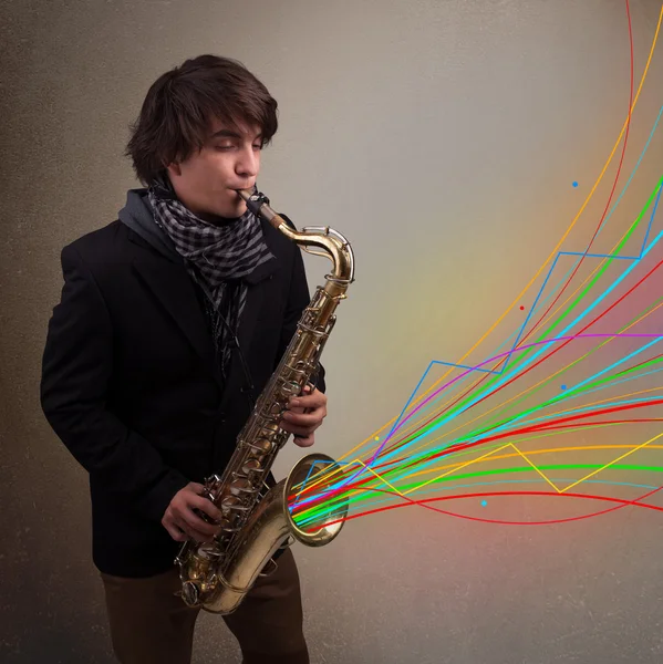 有吸引力上同时多彩抽象的萨克斯管演奏的音乐家 — 图库照片