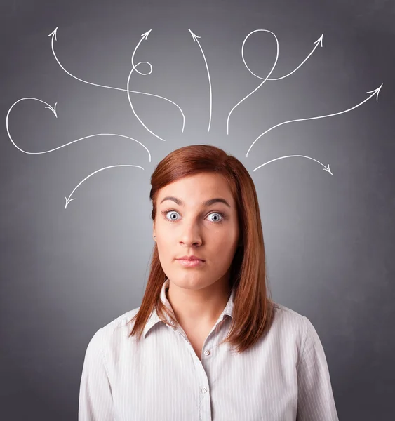 Young girl thinking with arrows overhead — Stock Photo, Image