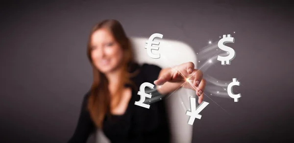 Young lady throwing currency icons — Stock Photo, Image