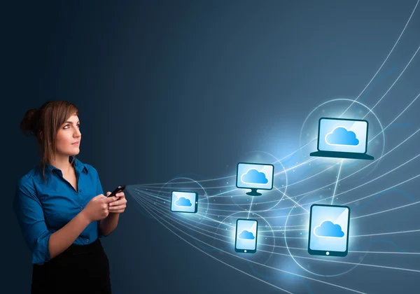 Pretty lady typing on smartphone with cloud computing — Stock Photo, Image