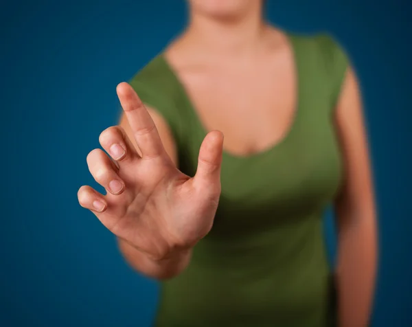 Mujer presionando botón imaginario — Foto de Stock
