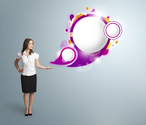 Attractive woman presenting abstract speech bubble copy space — Stock Photo, Image