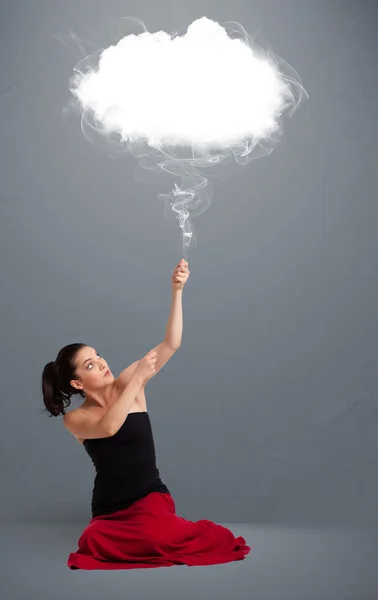 Beautiful lady holding cloud — Stock Photo, Image