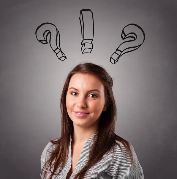 Young lady thinking with question marks overhead — Stock Photo, Image