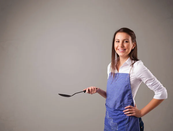 Mujer bonita sosteniendo una cuchara —  Fotos de Stock