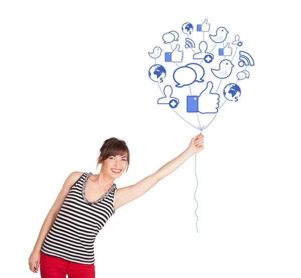 Happy lady holding social icon balloon — Stock Photo, Image