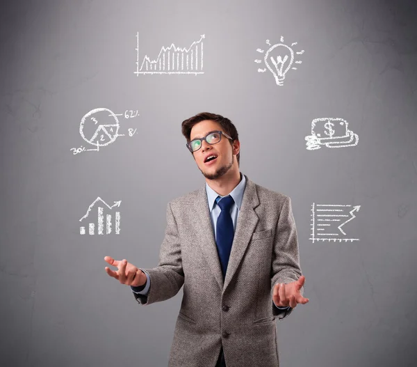 Young boy juggling with statistics and graphs — Stock Photo, Image