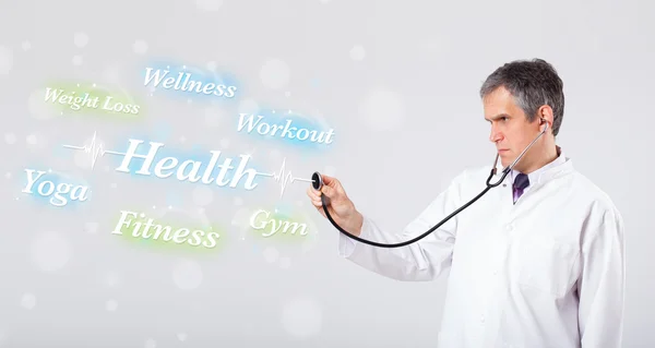 Medico clinico che indica la raccolta di salute e fitness di wor — Foto Stock
