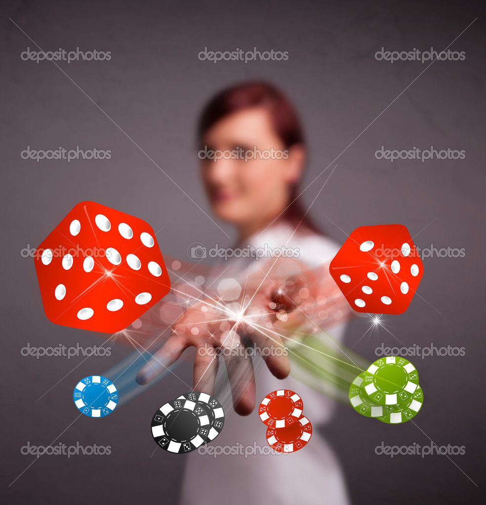 Young woman throwing dices and chips Stock Photo by ©ra2studio 25149605