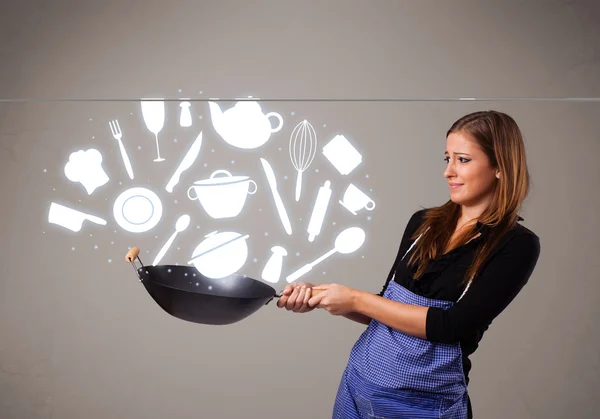 Mujer joven con iconos accesorios de cocina —  Fotos de Stock