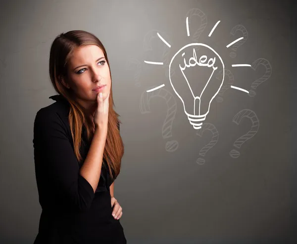 Young girl comming up with a light bubl idea sign — Stock Photo, Image