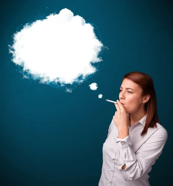 Young woman smoking unhealthy cigarette with dense smoke — Stock Photo, Image