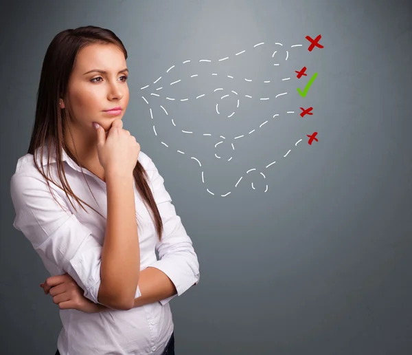 Young woman choosing between right and wrong signs — Stock Photo, Image