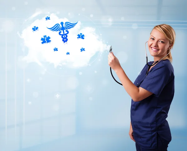 Giovane medico con nuvola astratta e icone mediche — Foto Stock