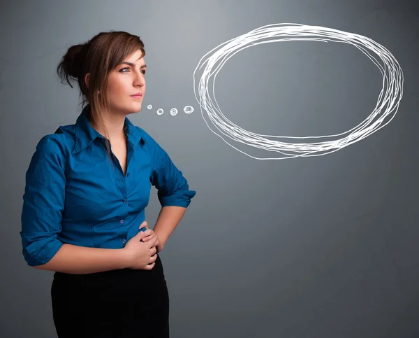 Young lady thinking about speech or thought bubble with copy spa — Stock Photo, Image