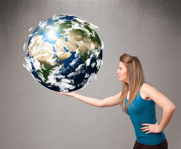 Vacker flicka som håller 3D-planeten jorden — Stockfoto