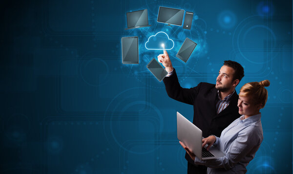 Happy couple touching cloud service