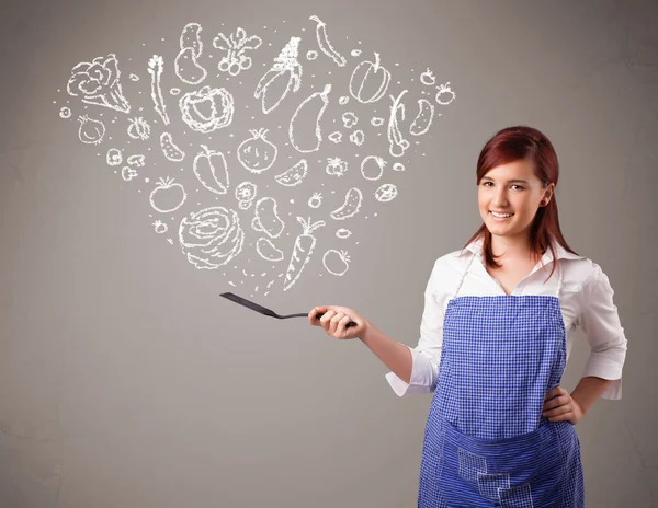 Woman cooking vegetables — Stock Photo, Image