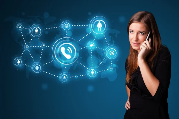 Menina bonita fazendo telefonema com ícones de rede social — Fotografia de Stock