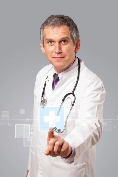 Doctor pressing modern medical type of button — Stock Photo, Image