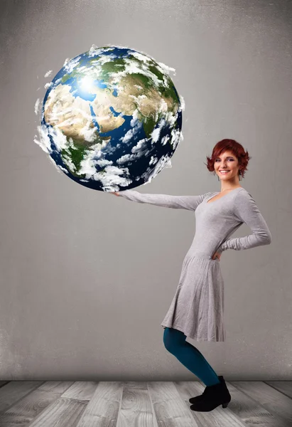 Pretty girl holding 3d planet earth — Stock Photo, Image