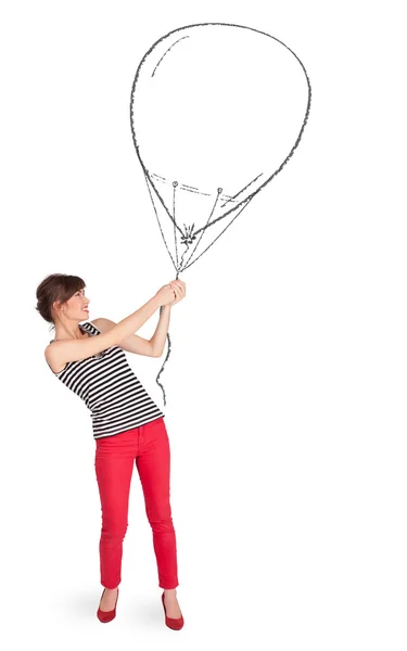Vacker kvinna som håller ballong ritning — Stockfoto