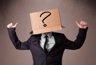 Businessman gesturing with a cardboard box on his head with ques clipart