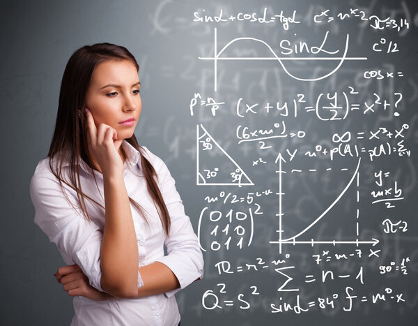 Beautiful school girl thinking about complex mathematical signs