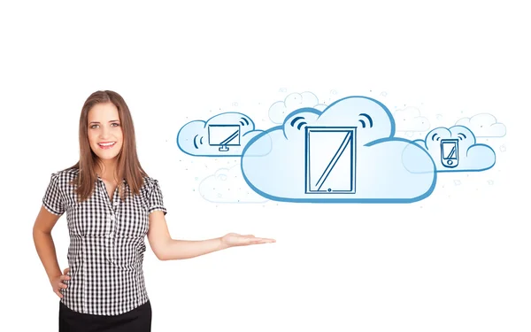 Young woman presenting modern devices in clouds — Stock Photo, Image